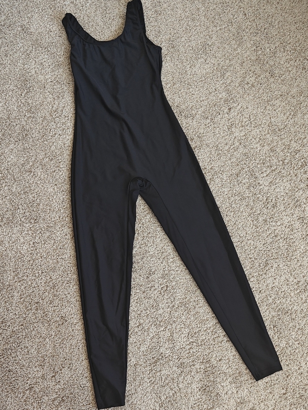 Sleek Black Scoop-Neck Sleeveless Jumpsuit